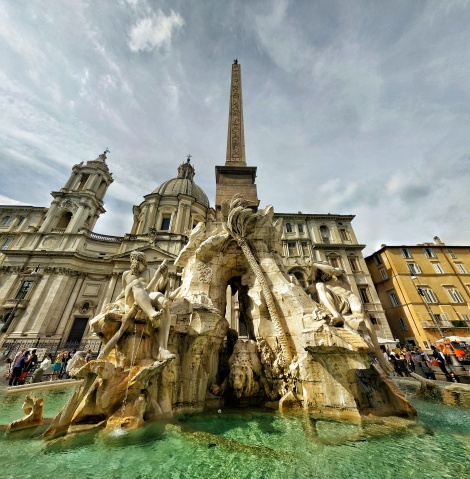 Panoramic photo of Piazza Navona, in Rome, on the first day of our trip to Italy. Always buzzing with flocks of tourists with their cameras and street vendors trying to sell selfie sticks, Piazza Navona stands as one of the most conspicuous symbols of the capital of the Ancient Roman Empire. Copyright © Pablo Gorostiaga 2015